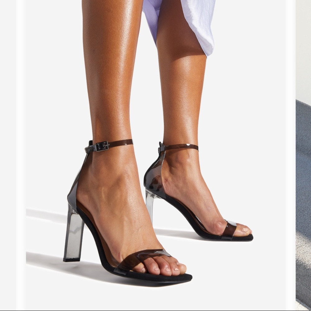 Smoke black strap heel never worn